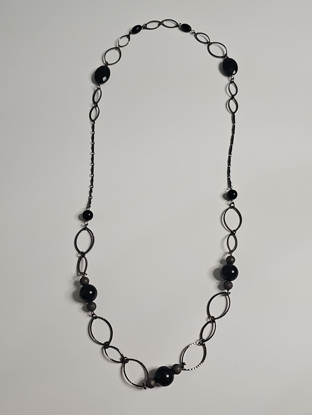 Elegant Black Bead Necklace with Interlocking Oval Links